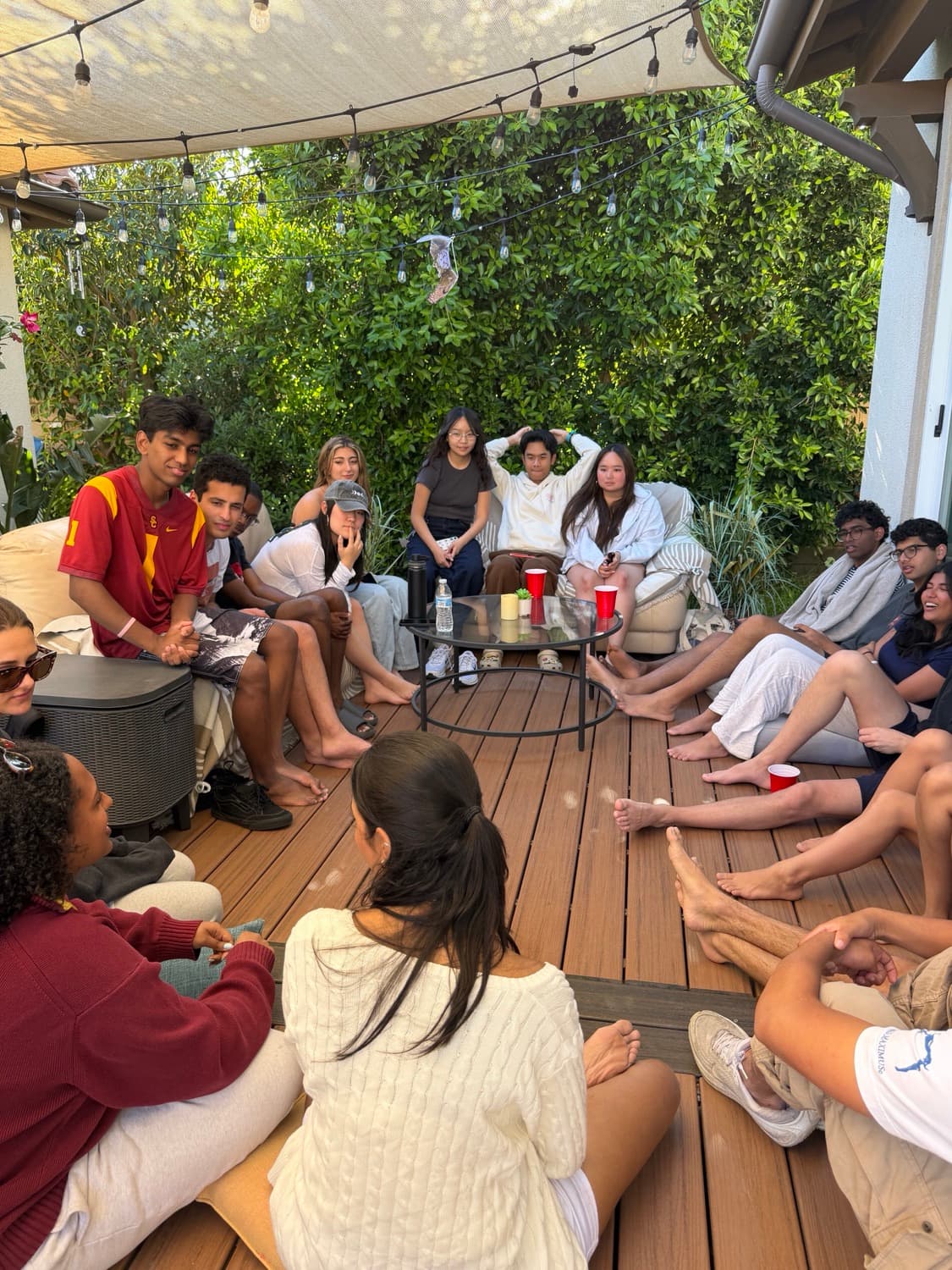 The club gathered in a circle at the retreat